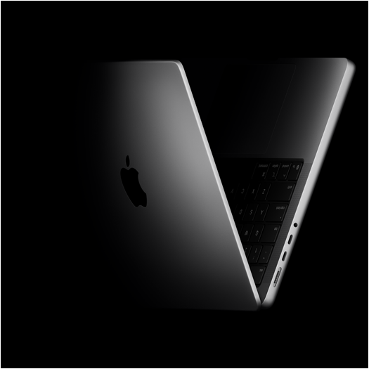 MacBook Pro positioned into the shape of a V, referencing the M5 kiibiga