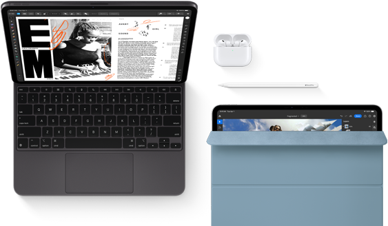 iPad Pro attached to Magic Keyboard, front exterior, space black color, rounded corners, black display bezel, open, display showing article editing app with text and photograph of a woman playing music, Airpods 4 in open case, blue Smart Folio cover on iPad Pro with Apple Pencil Pro resting atop device, cover slightly open revealing display